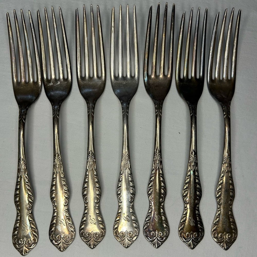 7 Vintage Holmes & Edwards dinner forks. Unpolished Monogrammed L
